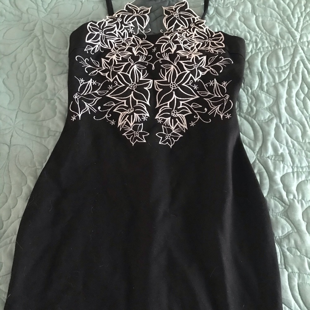 Black bodycon dress with white lace